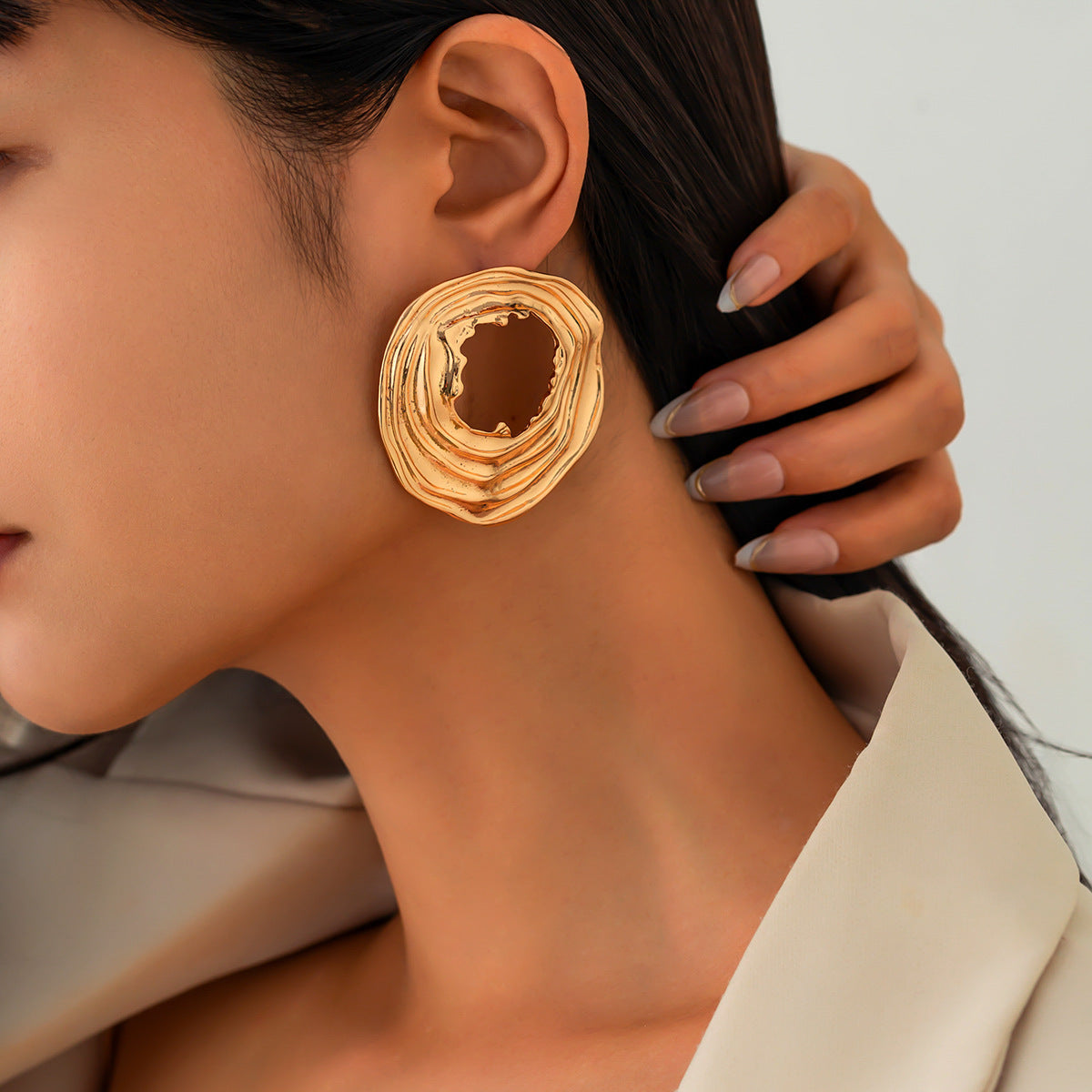 Textured open-circle earrings with sculptural ripples - Limali