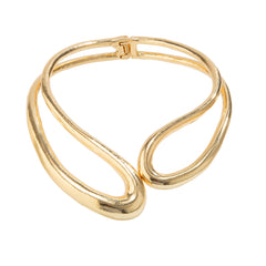 Twisted open metal choker with sculptural wave design - Dolkia