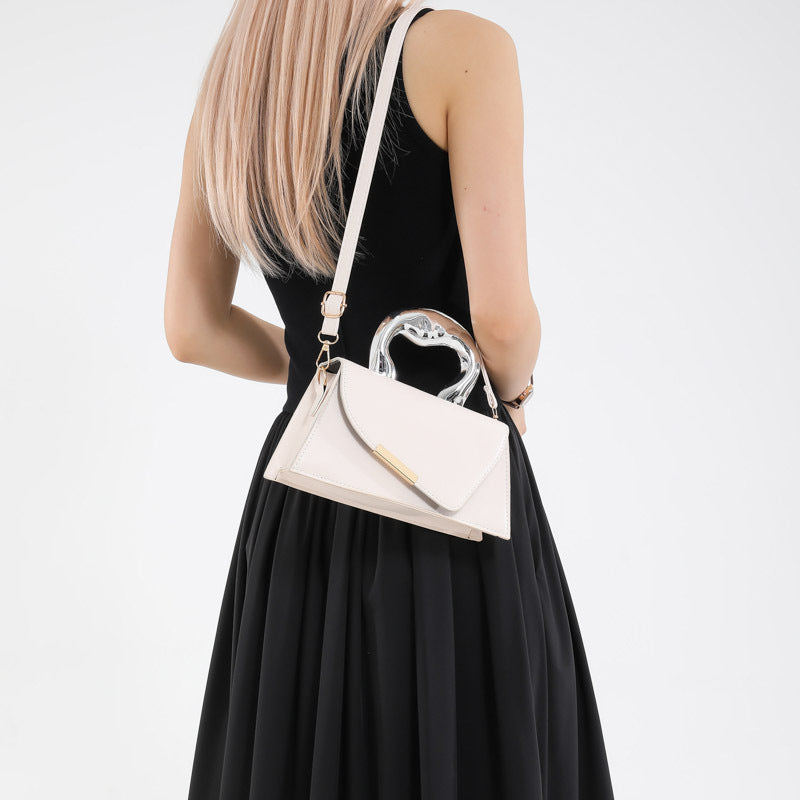 heart-handle mini bag with geometric flap – LEXIE