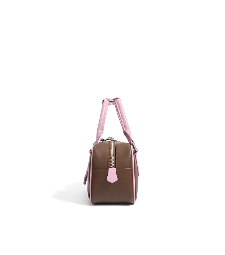 structured mini tote with key charm and top handles – NOLAR