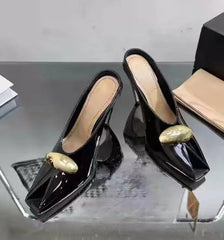 black leather mules with gold oval detail - LOMA