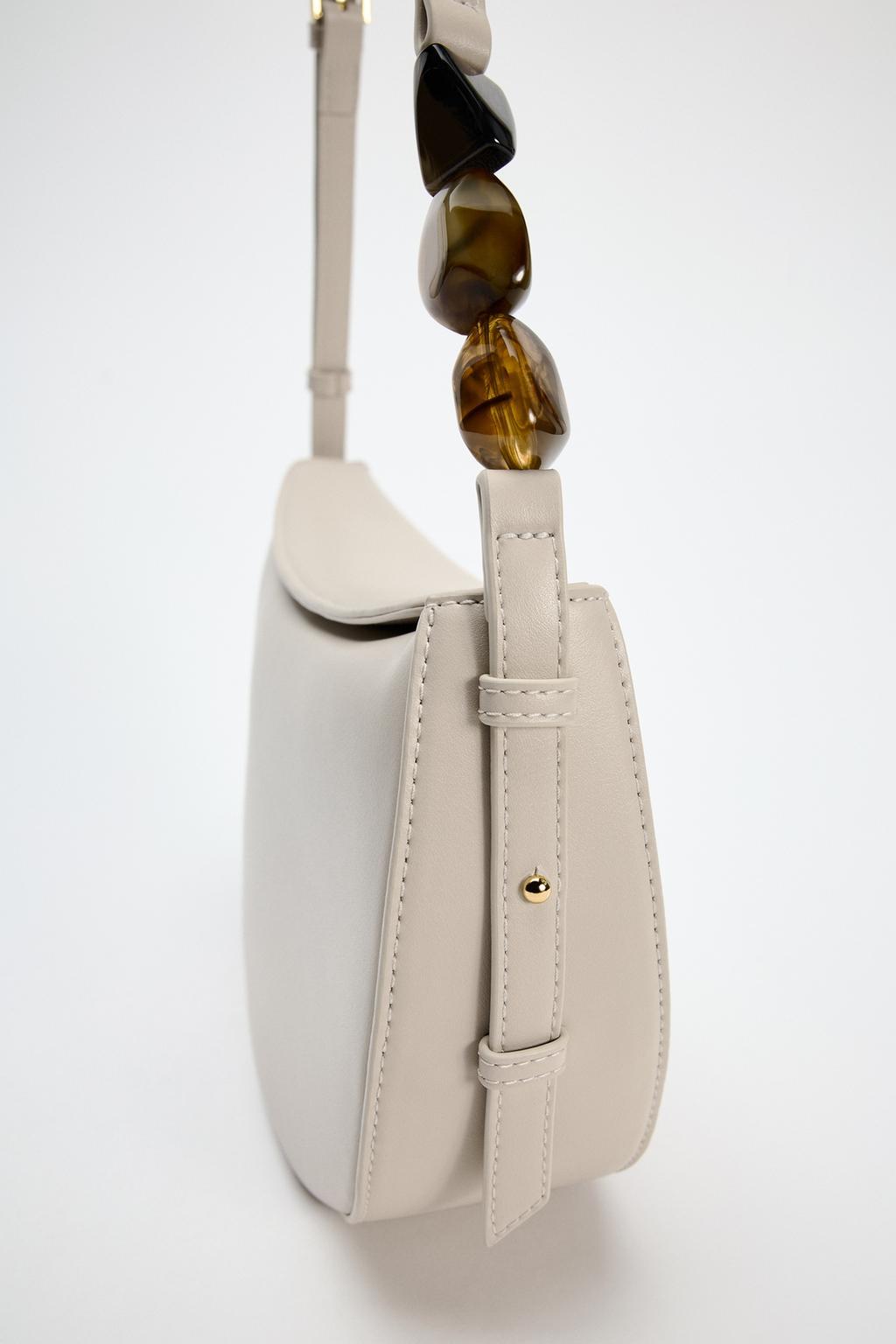 crescent-shaped shoulder bag with resin bead detail – ONRA