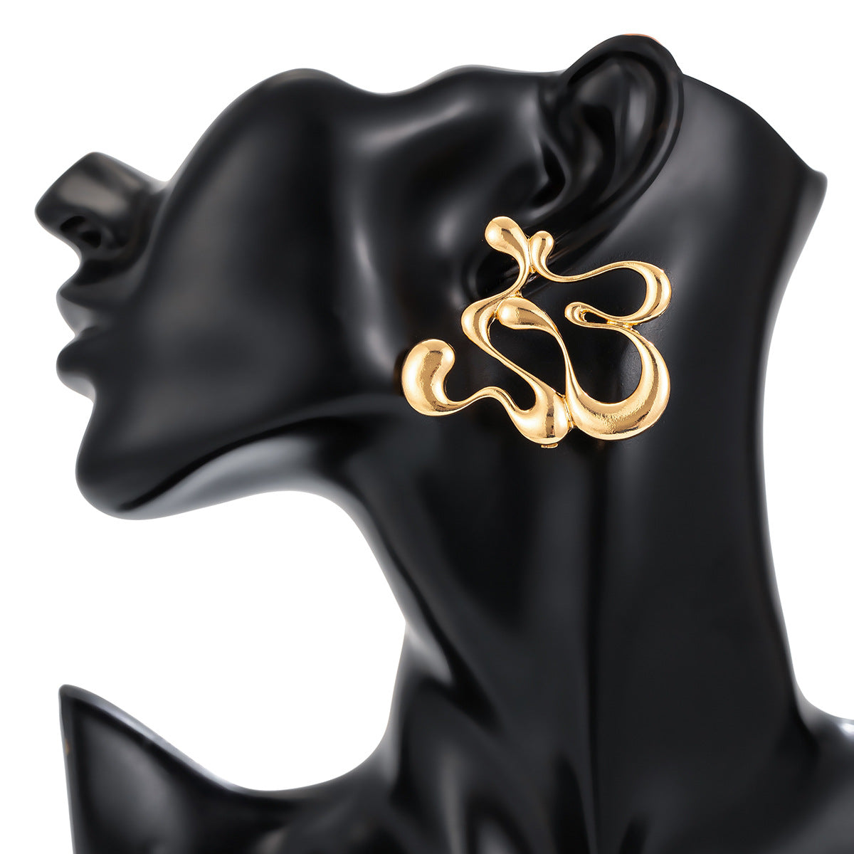 Sculptural drip-shaped earrings with statement curves – Lunimak