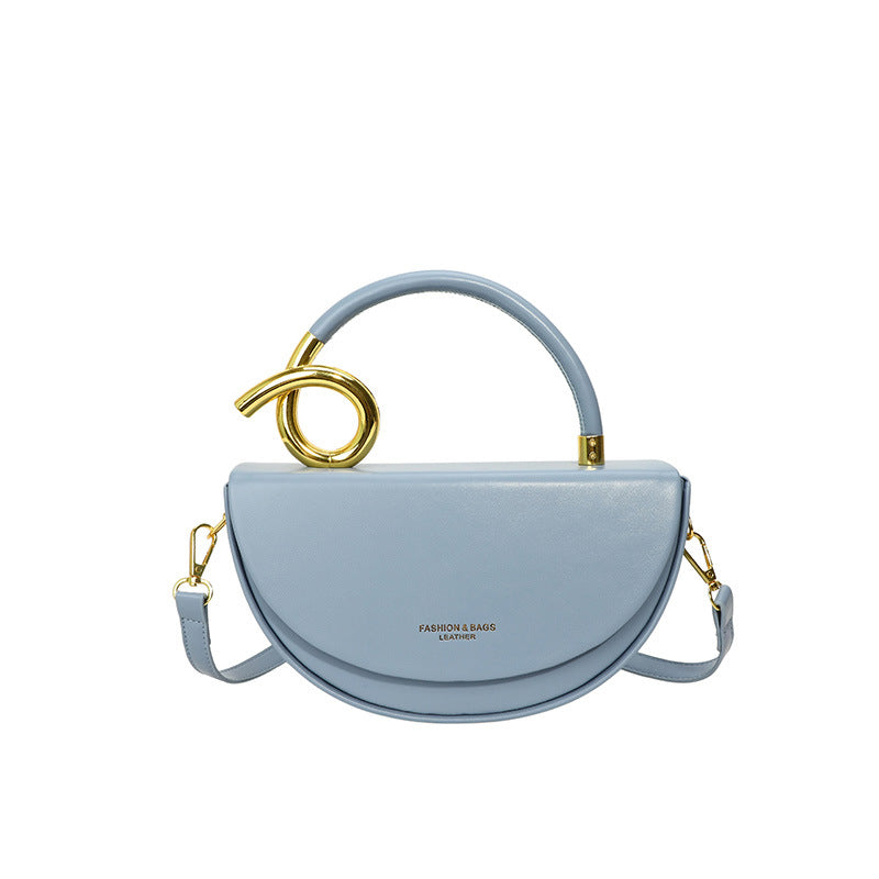 half-moon leather handbag with gold spiral handle – ORENA