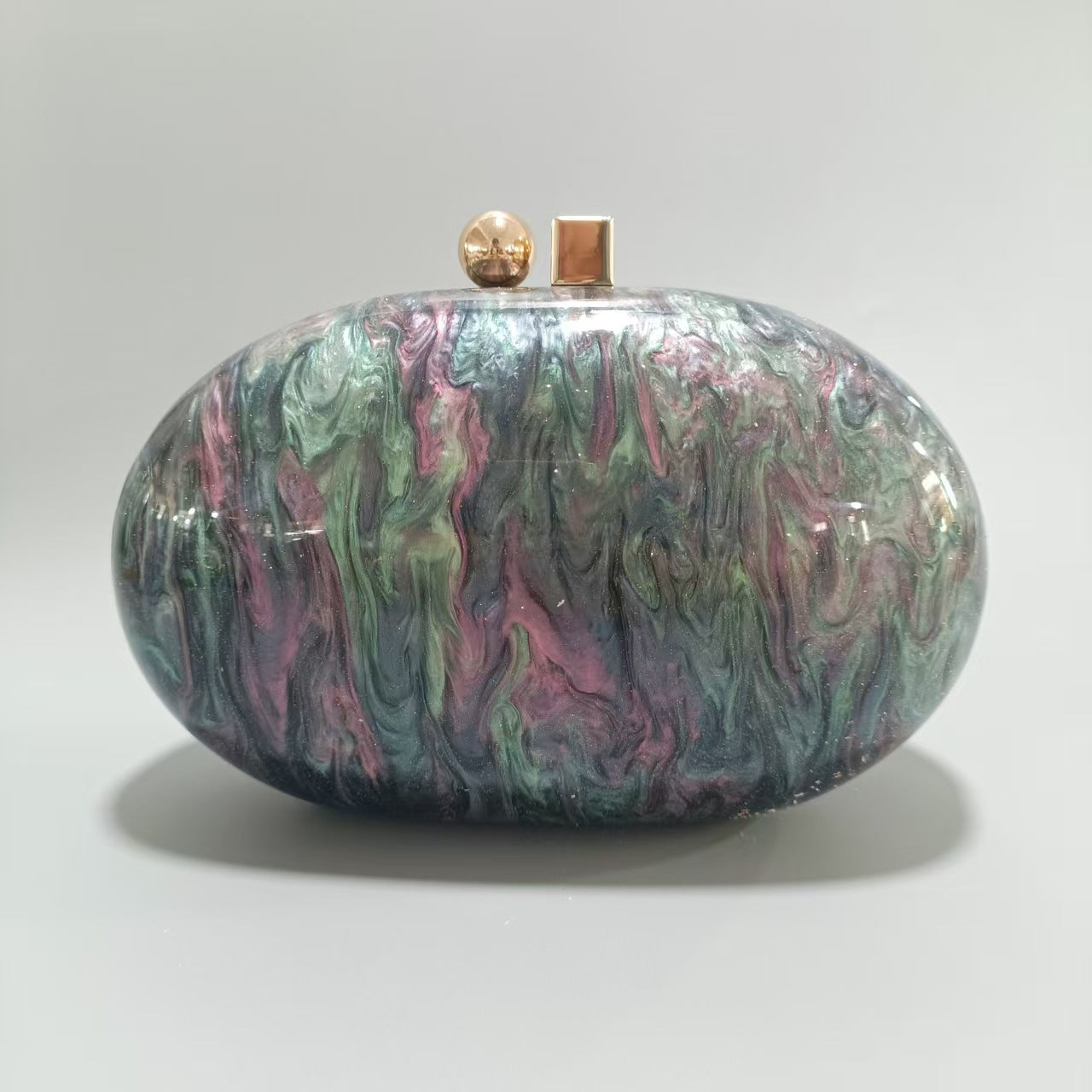 Oval marble clutch with gold clasp and chain handle - Zigru
