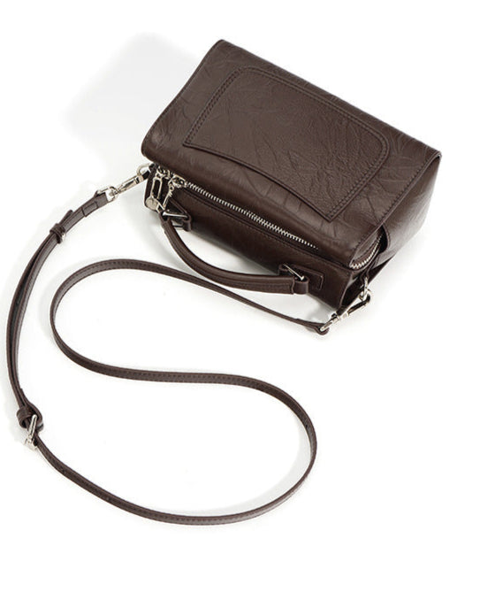 structured trapeze handbag with front patch pocket - NOXIR