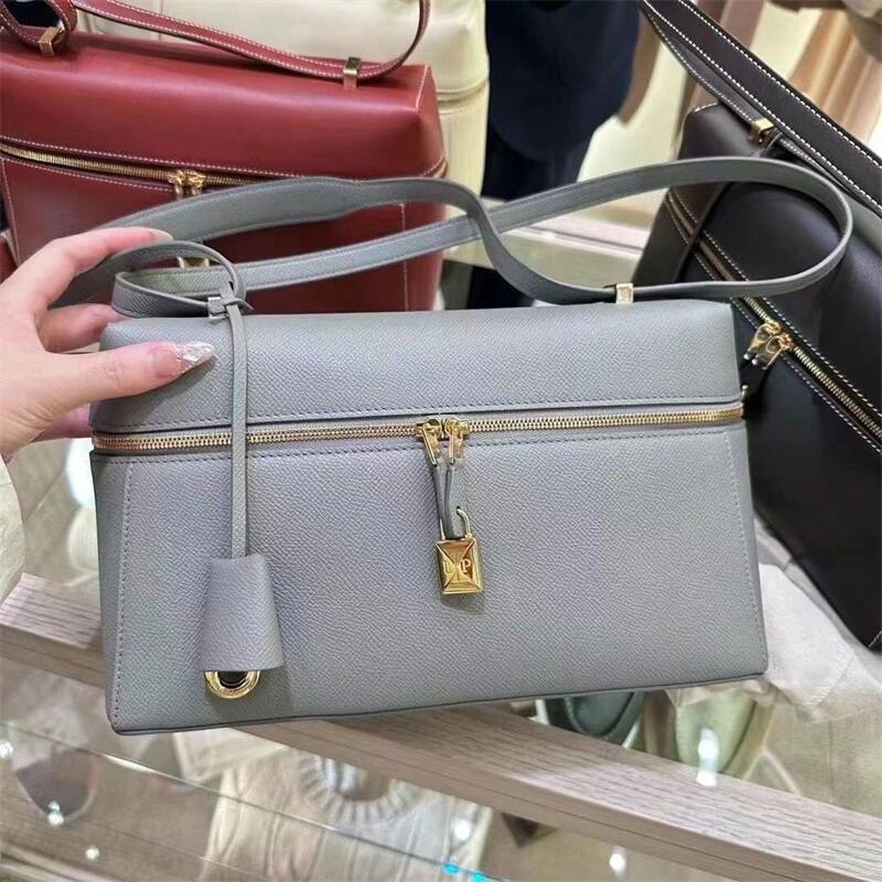 structured leather crossbody with gold lock detail – VERA