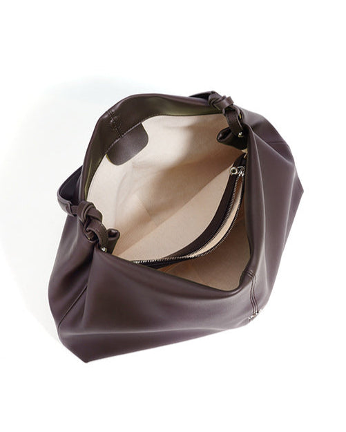 slouchy shoulder bag with circular buckle strap - CASSIAZ