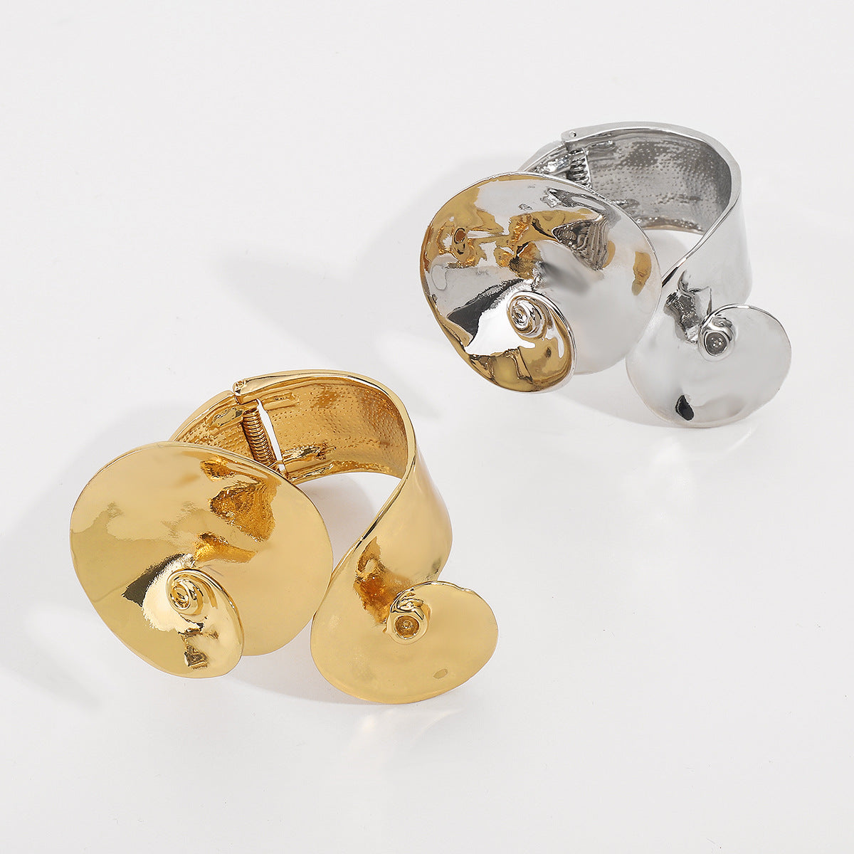 sculptural cuff bracelet with spiral disc detail – LYRAZ