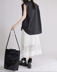 Sleeveless shirt with asymmetrical pleats - Lima