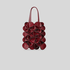 sculpted leather tote bag with floral petal design – ONYX