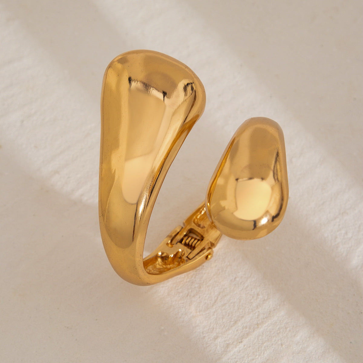 fluid teardrop cuff bracelet in polished gold – VELA