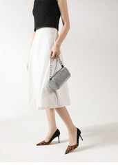 pointed-toe pumps with leopard print and black suede contrast - Solado
