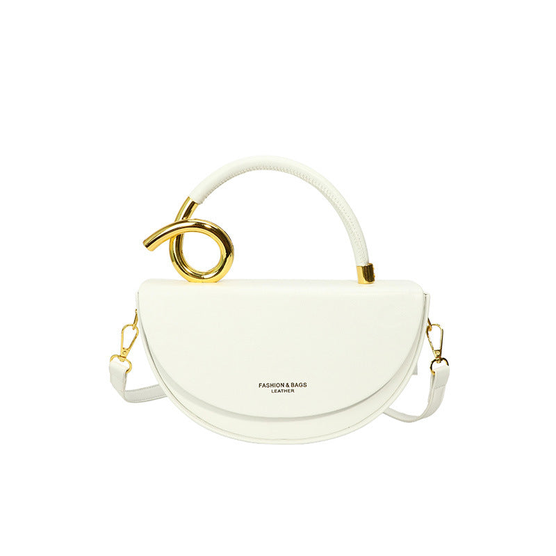half-moon leather handbag with gold spiral handle – ORENA