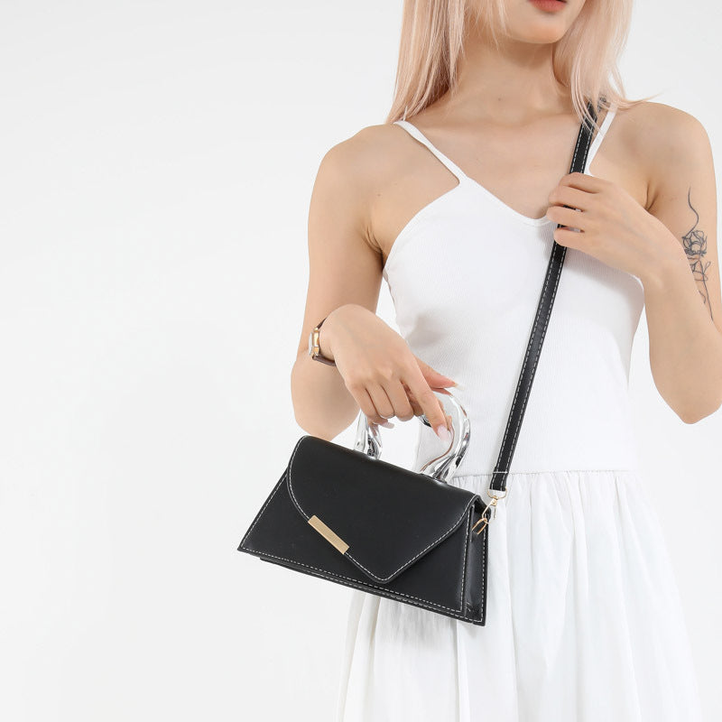 heart-handle mini bag with geometric flap – LEXIE
