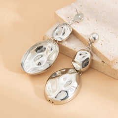 Hammered oval drop earrings with layered pebble design - Autri