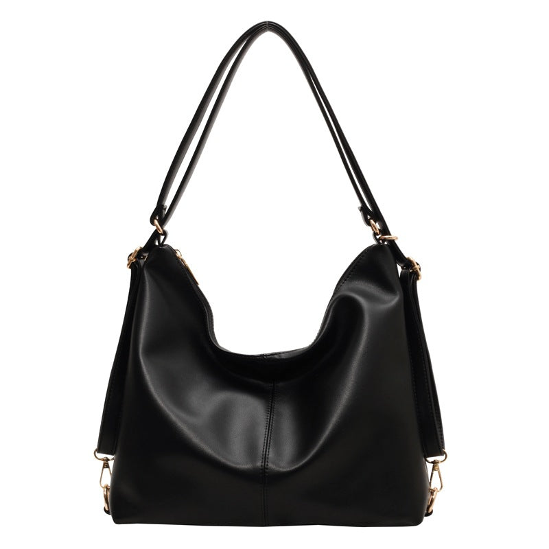 slouchy shoulder bag in black faux leather – ARYA