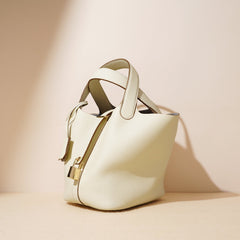 pebbled leather bucket bag with gold padlock – NOA
