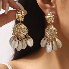 shell drop earrings with textured gold base – CORALIA