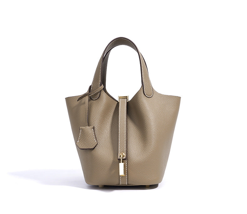 pebbled leather bucket bag with gold padlock – NOA