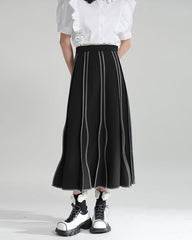 High-waisted flared skirt with contrasting wavy layers - Ejra