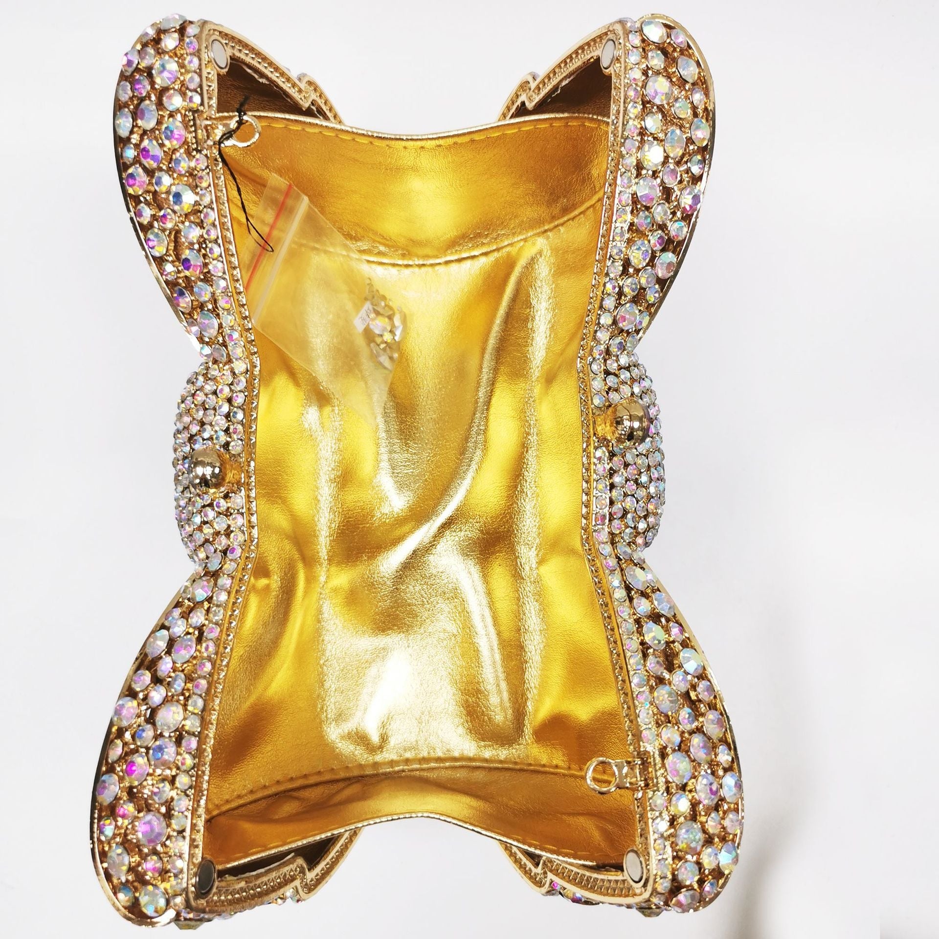 crystal bow-shaped clutch with emerald stones - Efrosini