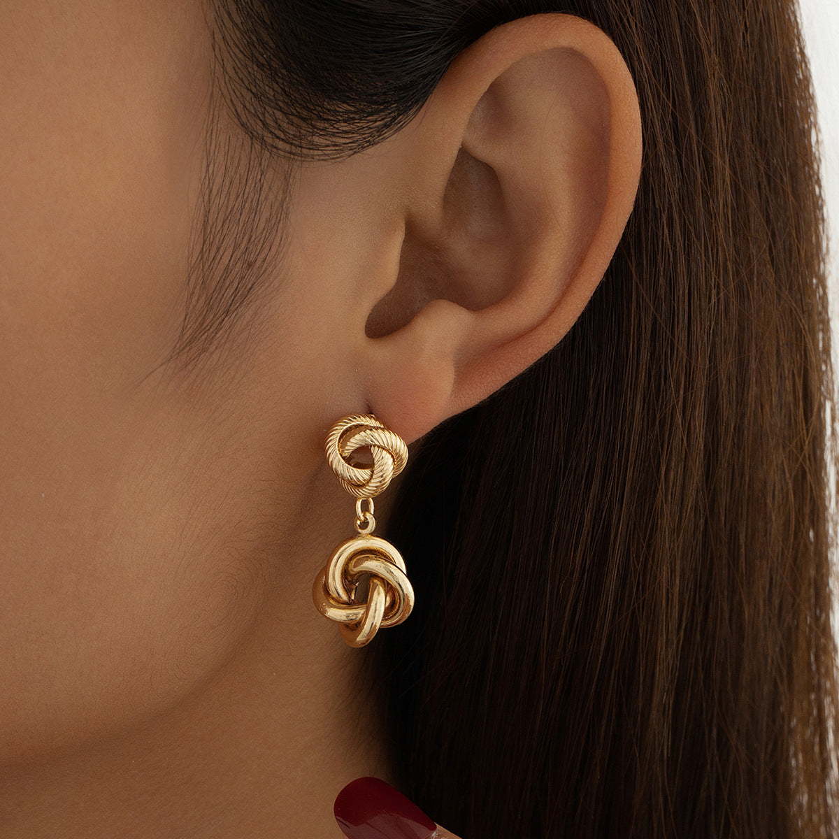Double knot drop earring with twisted rope detail – Nurti
