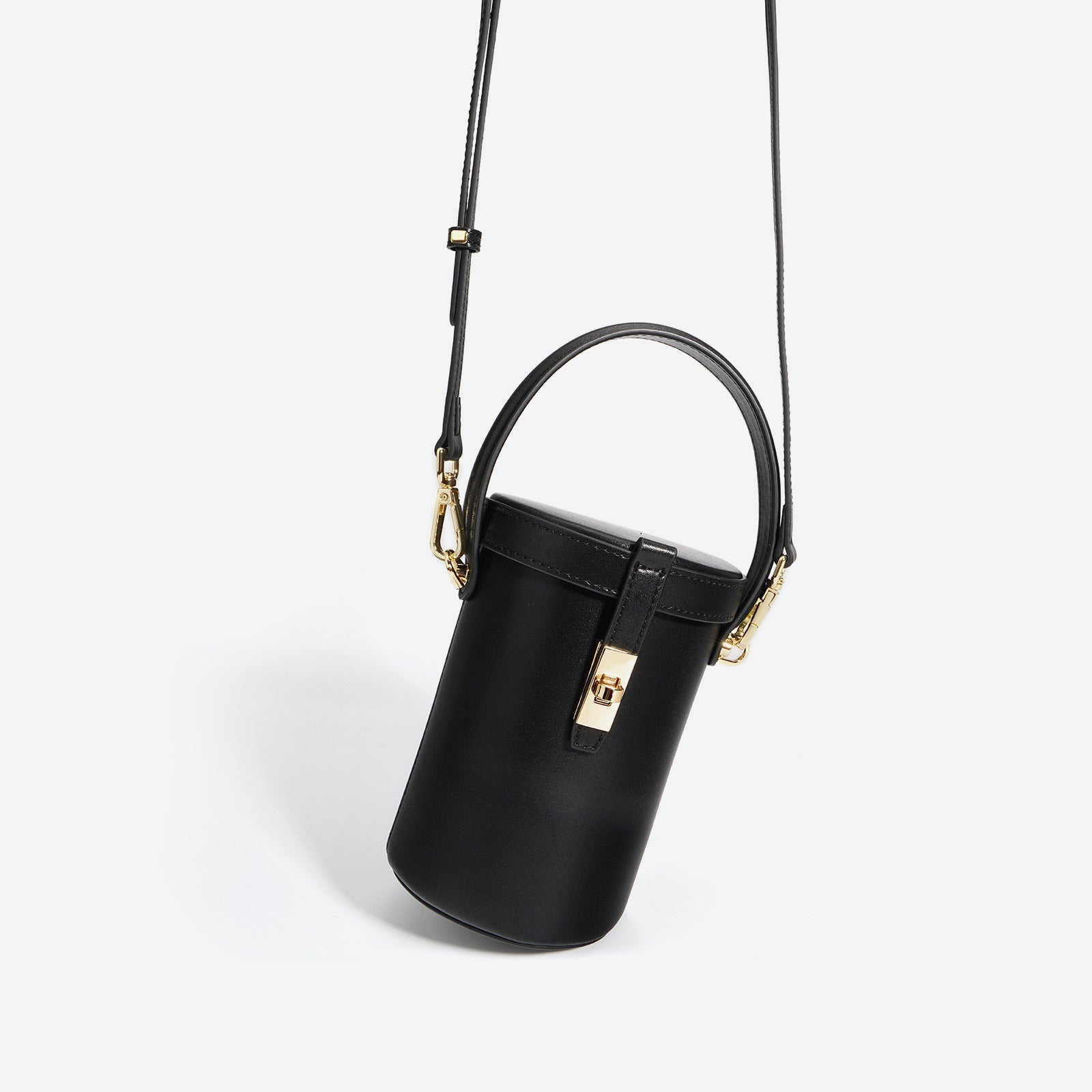 cylindrical top-handle crossbody bag with lock detail – ELINESE