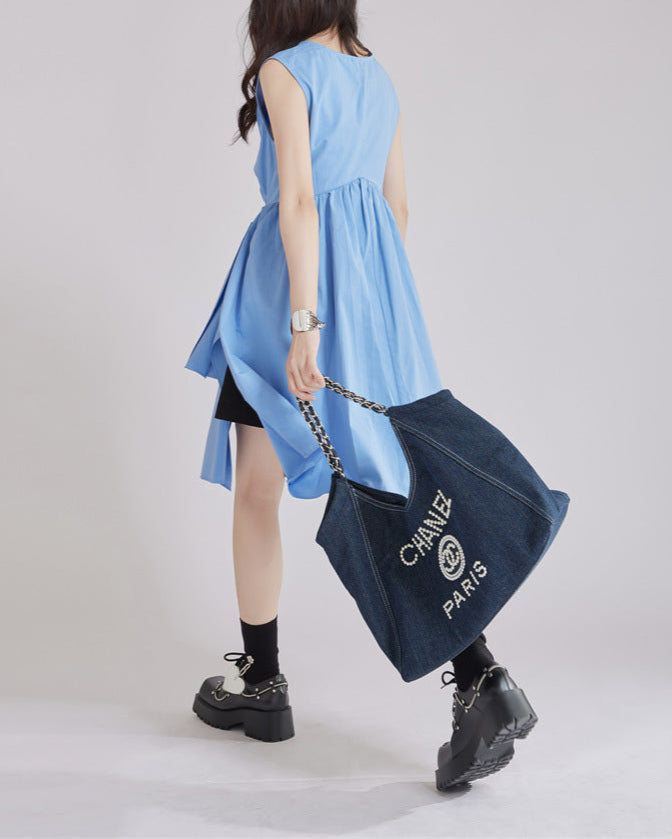 sleeveless wrap dress with asymmetric hem - KAIAZ
