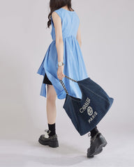 sleeveless wrap dress with asymmetric hem - KAIAZ