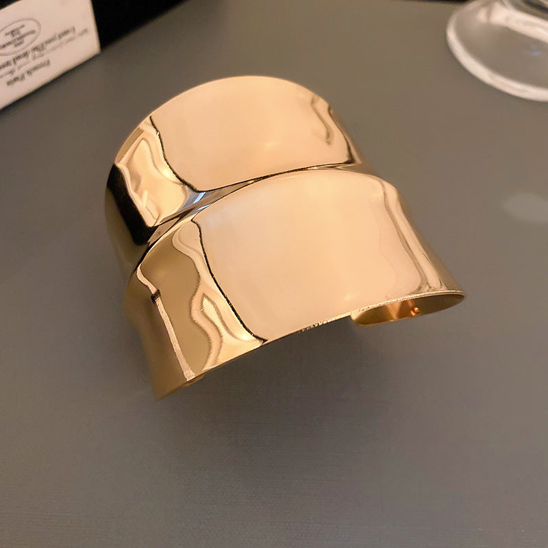 sculptural gold wide cuff bracelet with fluid contours – ARYO