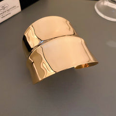 sculptural gold wide cuff bracelet with fluid contours – ARYO