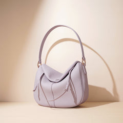 curved hobo bag with relaxed flap – LILAS