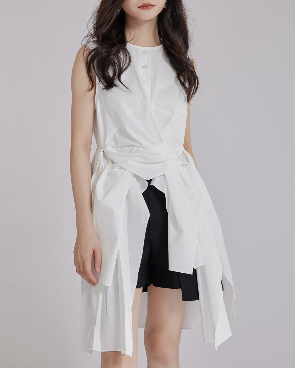 sleeveless wrap dress with asymmetric hem - KAIAZ