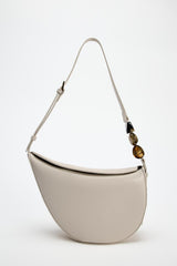 crescent-shaped shoulder bag with resin bead detail – ONRA