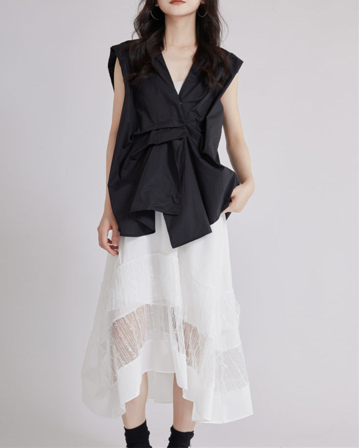 Sleeveless shirt with asymmetrical pleats - Lima