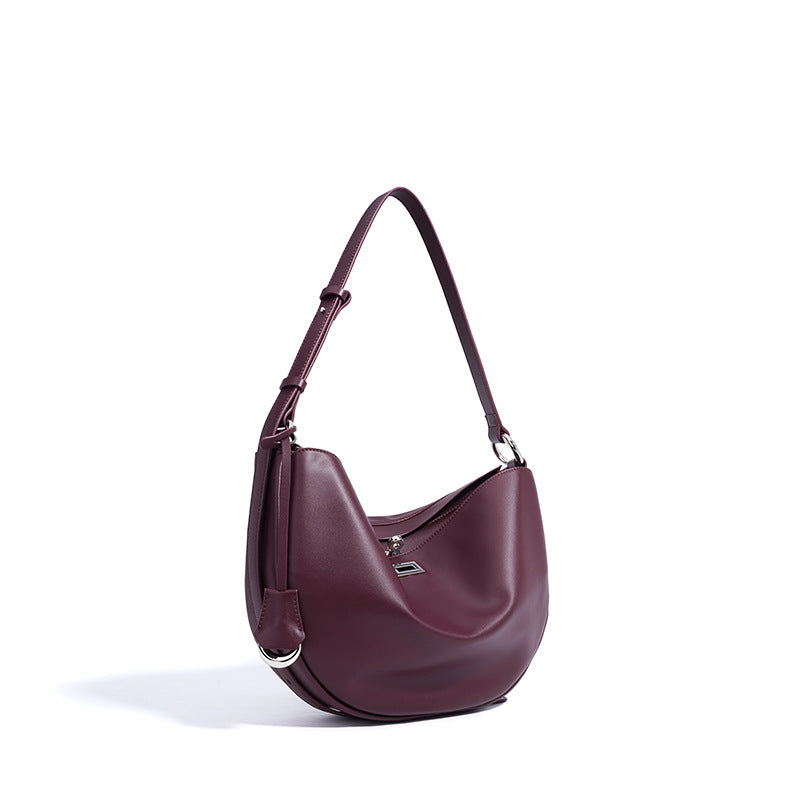 crescent moon shoulder bag with curved silhouette - STELZA
