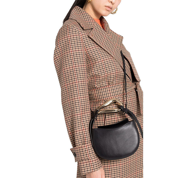 sculptural-handle saddle bag in tan leather – ARIS