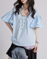 Short-sleeve blouse with decorative floral details - Buggri