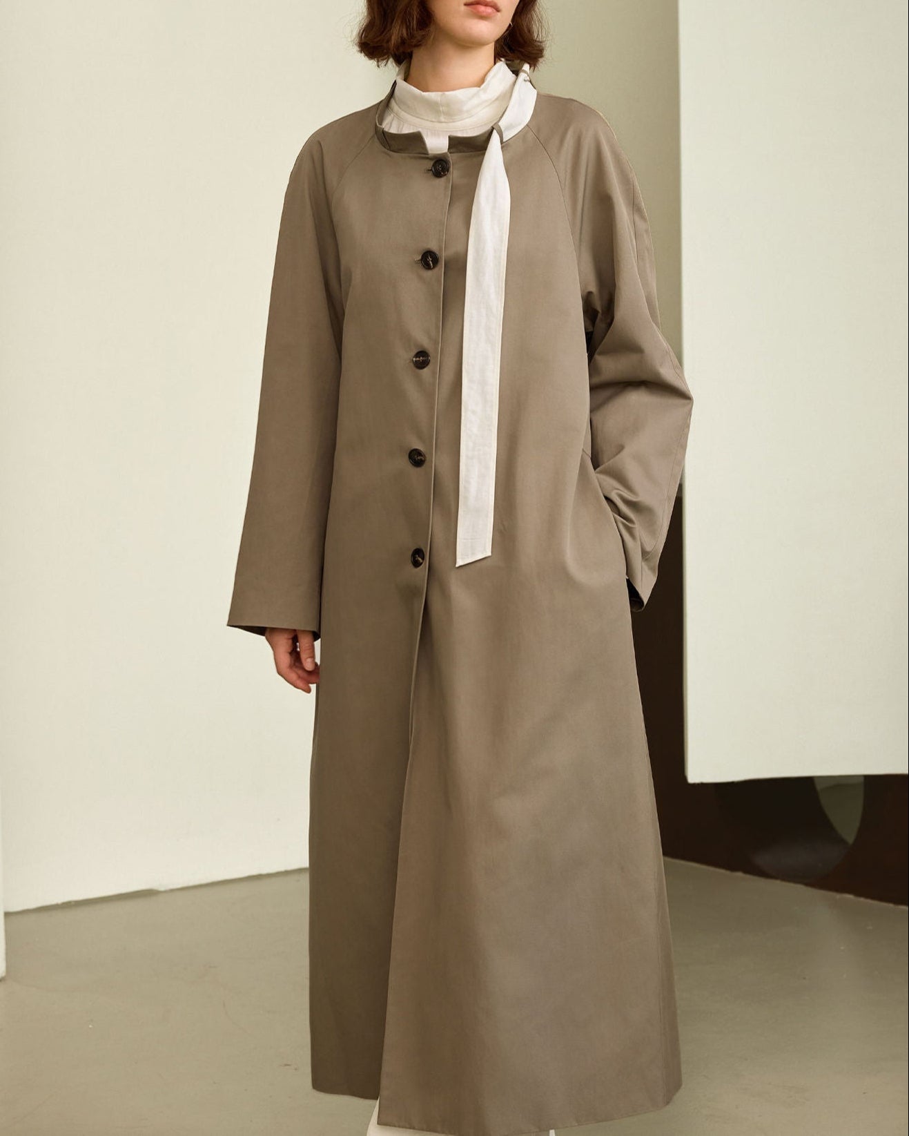 Longline buttoned coat with structured sleeves – Narwa