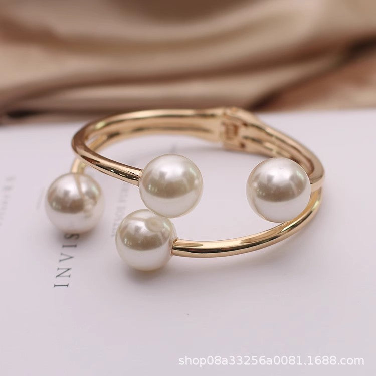 gold open cuff bracelet with oversized pearls – MILA