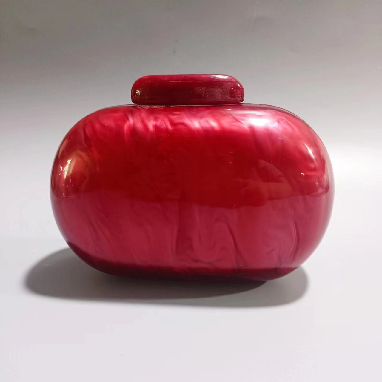 Marbled acrylic clutch with metal ring handle - Sundi
