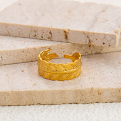 gold feather cuff earrings with textured engraving – PLUIMA