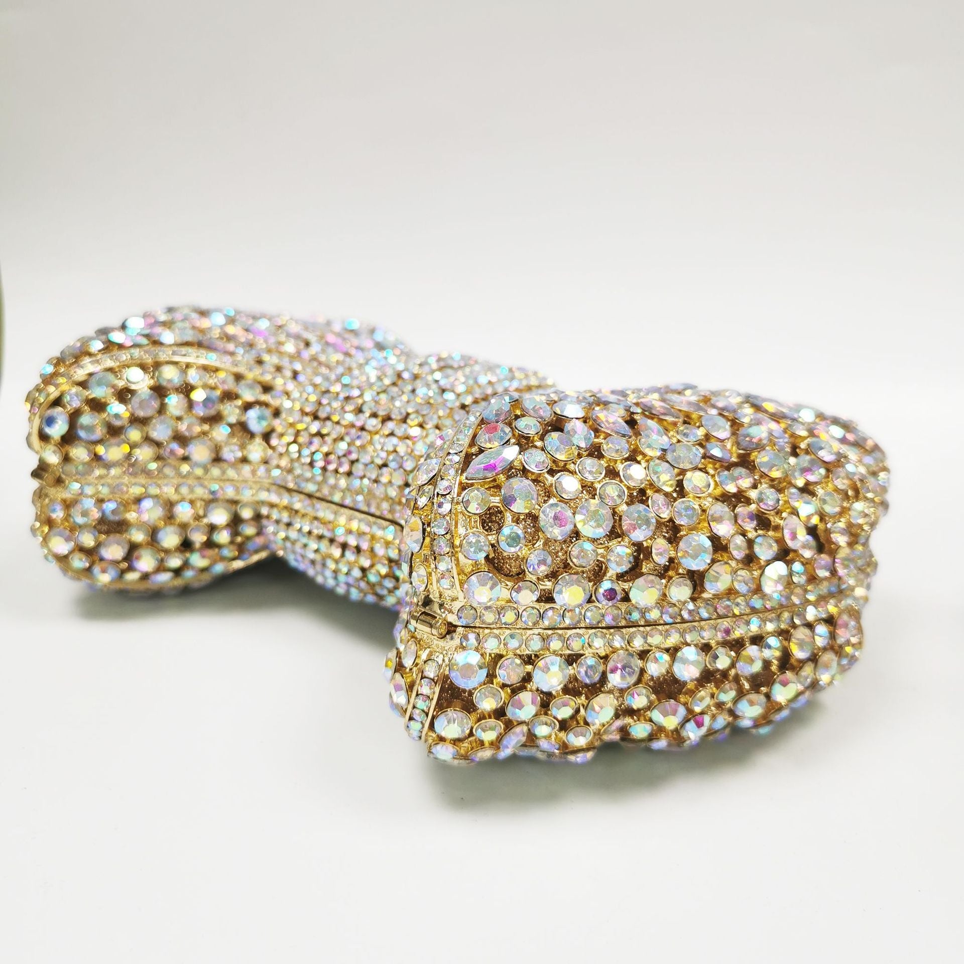 crystal bow-shaped clutch with emerald stones - Efrosini