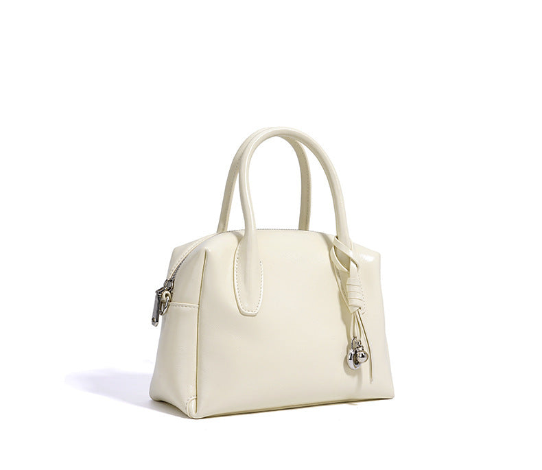 structured mini handbag with knotted charm - DELKA