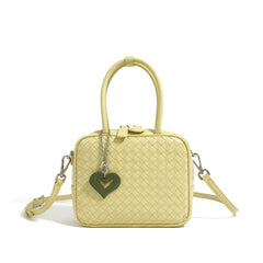 woven leather handbag with heart charm – AMORA