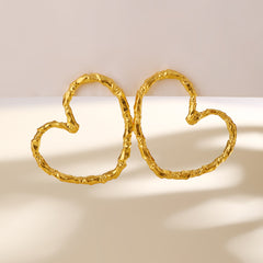 textured heart hoop earrings in matte gold – AMORA