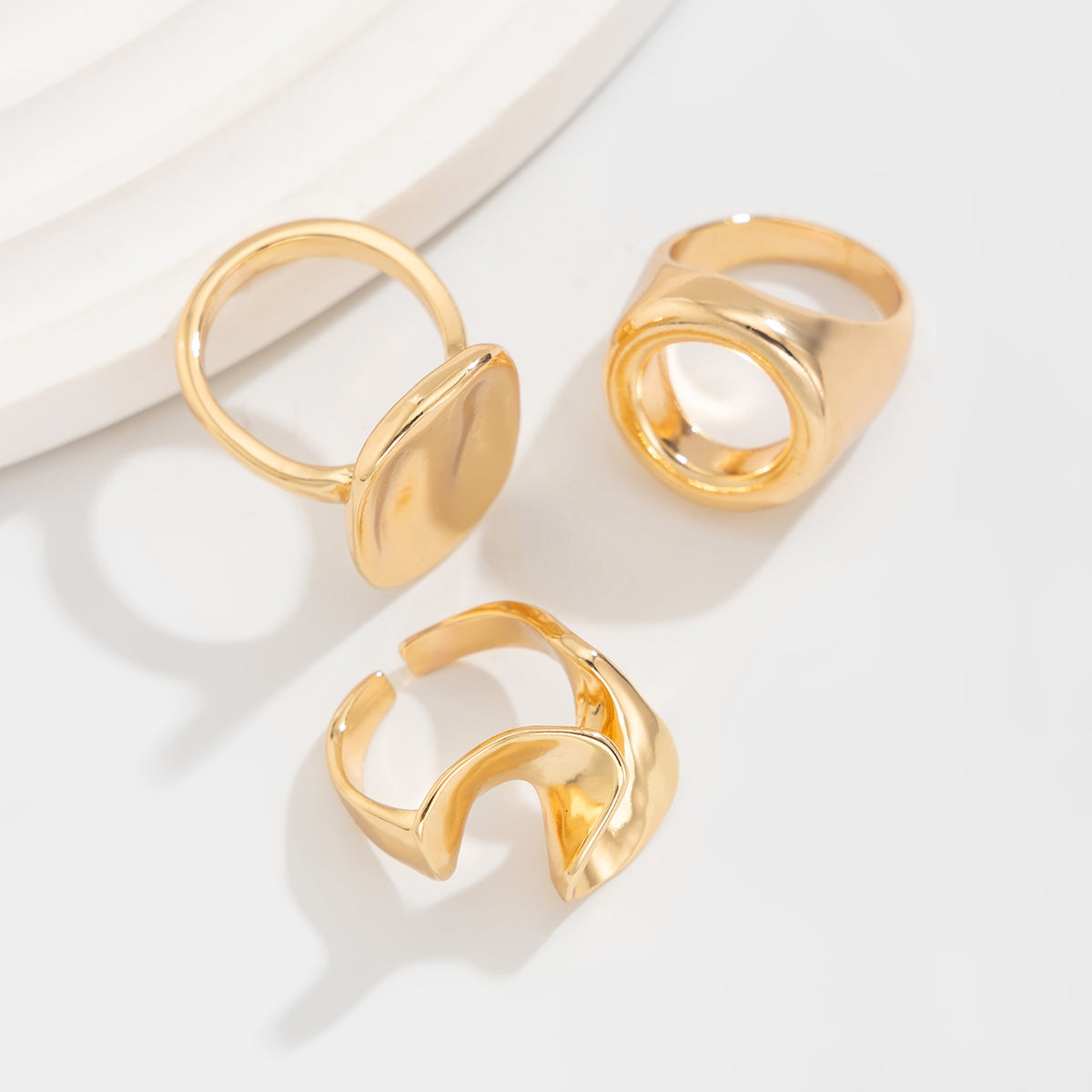 Bold sculptural rings set in mixed metals - Nisli