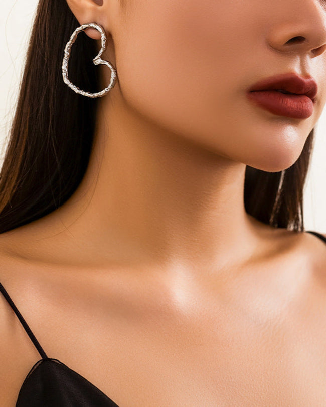 textured heart hoop earrings in matte gold – AMORA