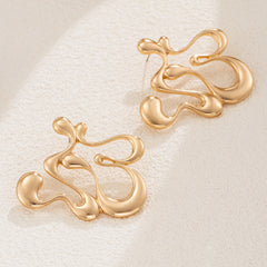 Sculptural drip-shaped earrings with statement curves – Lunimak